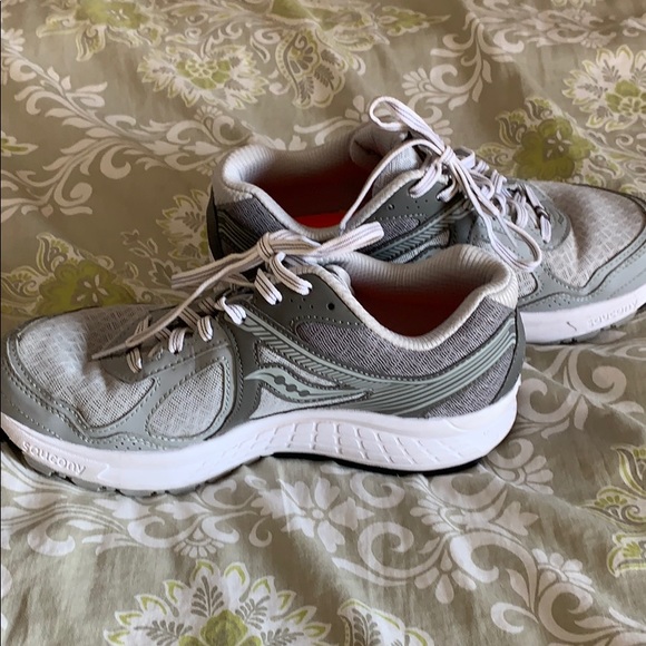 silver athletic shoes